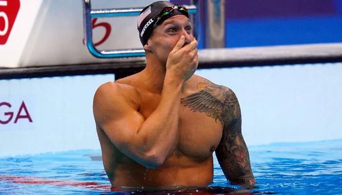 Team USA’s Caeleb Dressel wins men’s 100m freestyle – and first ...